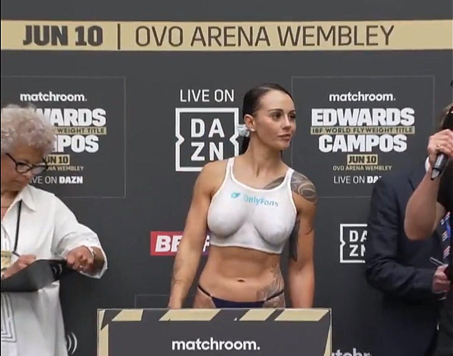 Topless boxer weigh in