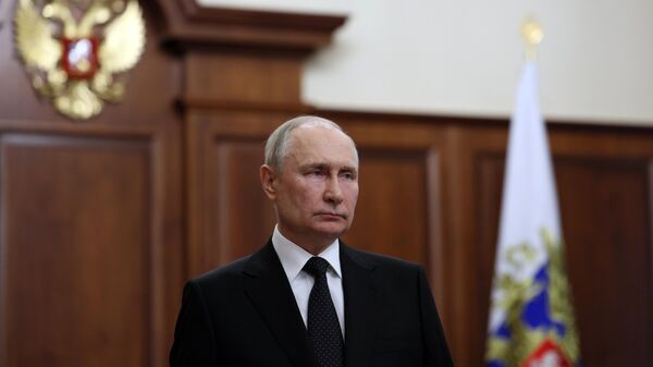 Президент РФ Владимир Путин во время обращения к гражданам России