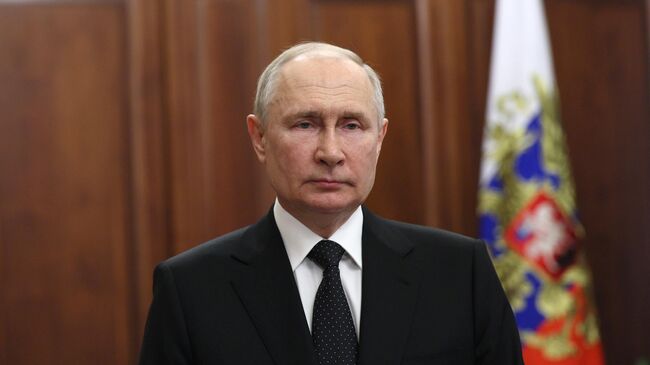 Президент РФ Владимир Путин во время обращения к гражданам России.