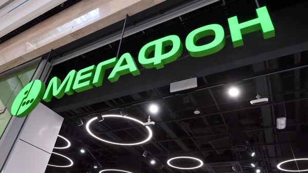 Логотип в офисе компании Мегафон в Москве