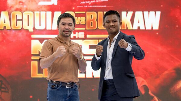 Филиппинский боксер Мэнни Пакьяо и тайский боец Сомбат Банчамек