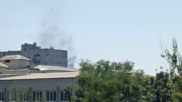 Дым после взрыва в Донецке