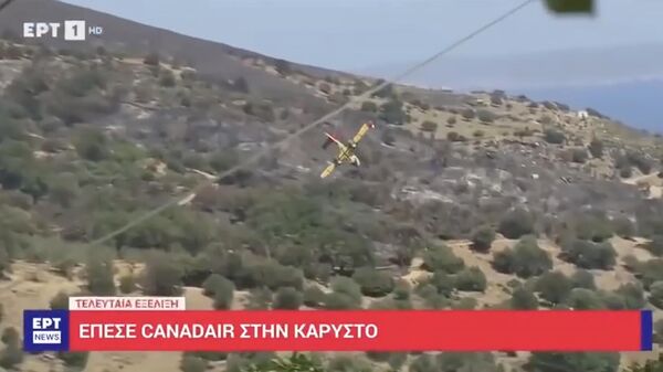 Кадр трансляции телеканала EPT с крушением пожарного вертолета в Греции