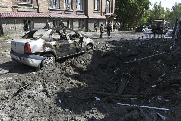 Автомобиль, сгоревший в результате обстрела Донецка со стороны ВСУ