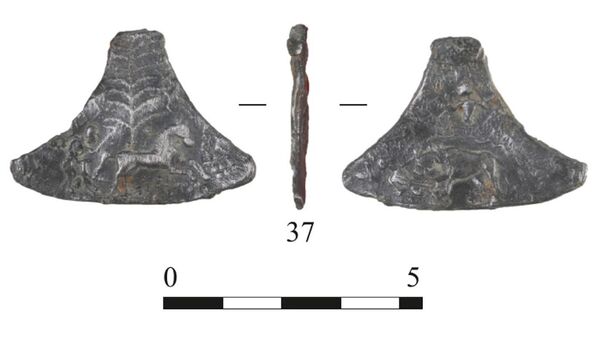 Топорик-амулет XIV–XVI веков, найденный археологами в Москве