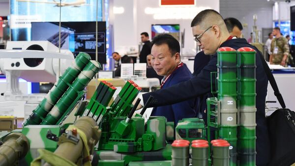Models of military equipment and weapons at the booth of the Chinese Ministry of Defense at the exhibition as part of the Army-2023 International Military-Technical Forum at the Patriot Convention and Exhibition Center