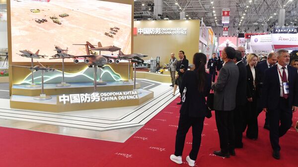 Visitors to the stand of the Chinese Ministry of Defense at the exhibition as part of the Army-2023 International Military-Technical Forum at the Patriot Convention and Exhibition Center