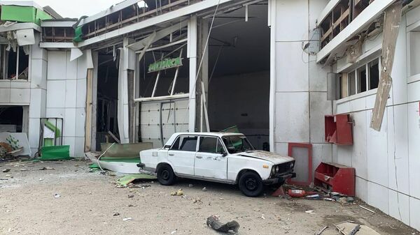 Последствия взрыва в здании автосервиса в Махачкале