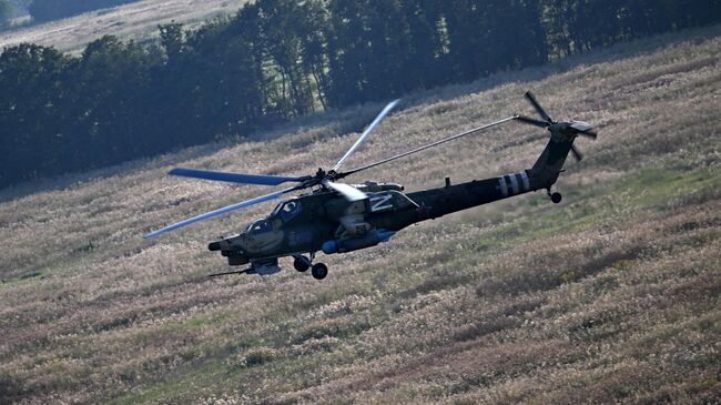 Вертолет Ми-28  во время боевого вылета в зоне СВО