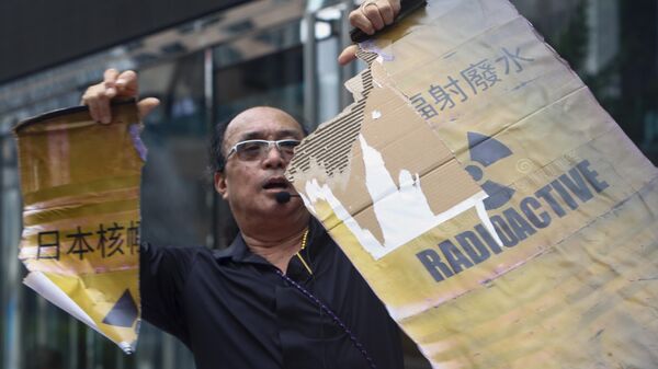 Акция протеста у Генерального консульства Японии в Гонконге после начала сброса воды с атомной электростанции Фукусима-1 в океан