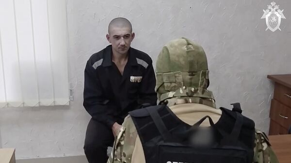 Военнослужащий ВСУ Денис Заец, виновный в совершении преступлений против мирного населения Северодонецка. Кадр видео
