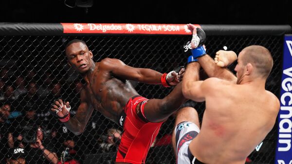 Бойцы UFC Шон Стрикленд и Исраэль Адесанья Бойцы UFC Шон Стрикленд и Исраэль Адесанья