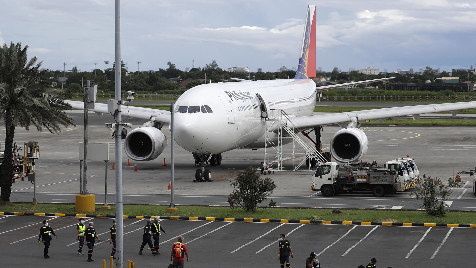 Самолет авиакомпании Philippine Airlines в аэропорту Манилы - РИА Новости, 1920, 24.09.2023