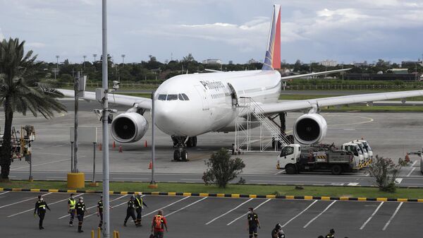 Самолет авиакомпании Philippine Airlines в аэропорту Манилы