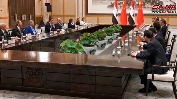 Председатель КНР Си Цзиньпин и президент САР Башар Асад во время встречи