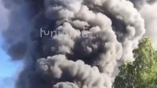 Дым на месте взрыва на бензоколонке в Степанакерте