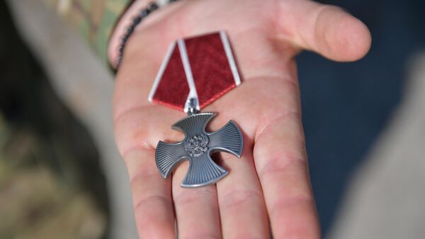 Орден Мужества во время награждения бойцов 810 бригады морской пехоты Черноморского флота в Запорожской области