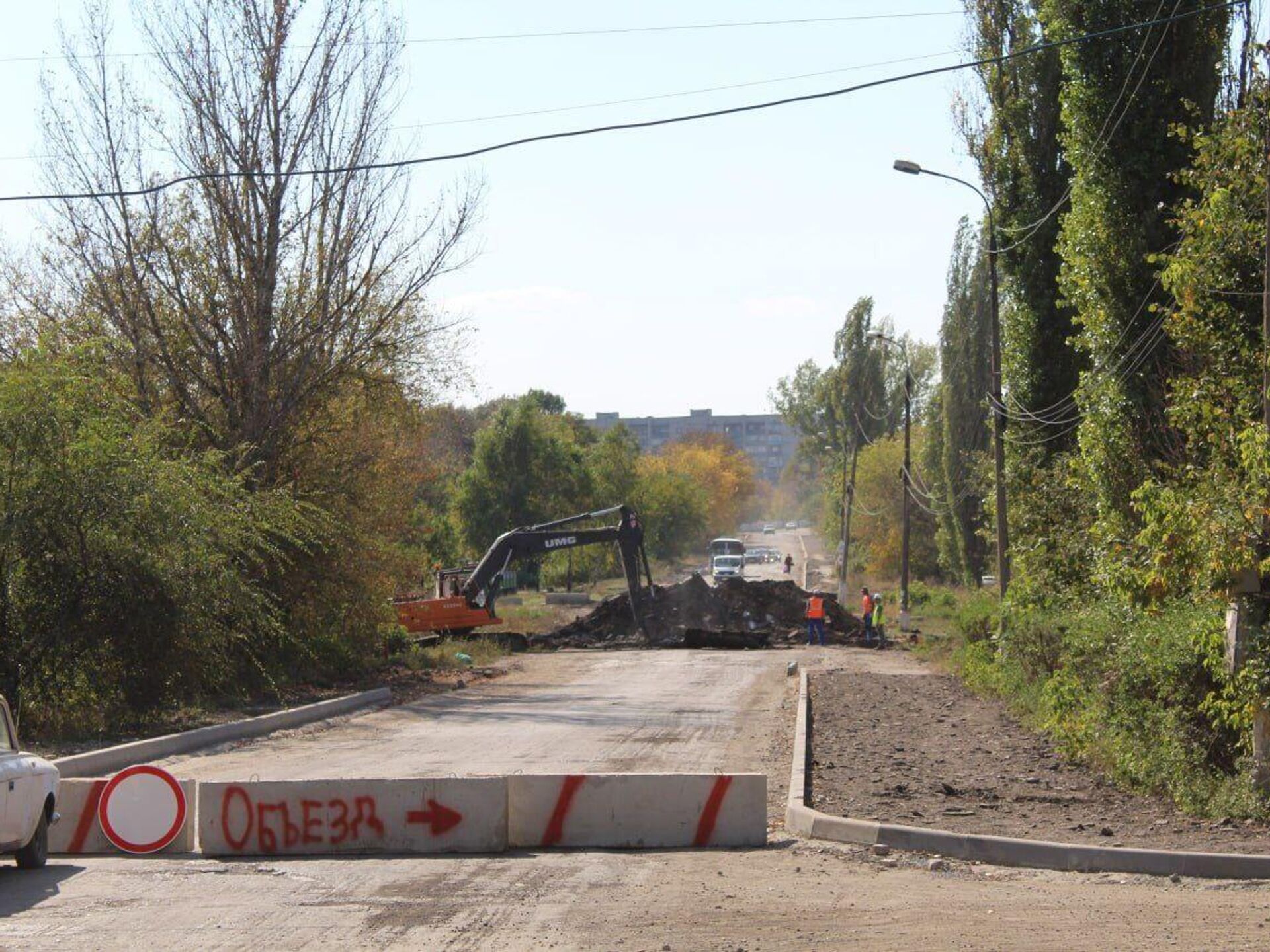 Иркутская область восстанавливает дороги в подшефном городе Кировске в ЛНР  - РИА Новости, 30.09.2023