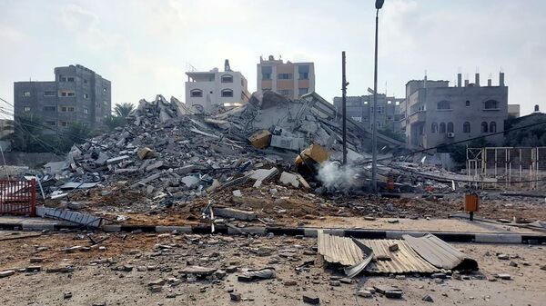 Обломки зданий, разрушенных в результате ракетных ударов ВС Израиля по Газе. Архивное фото