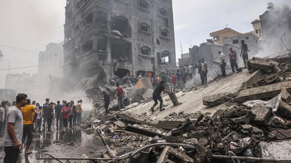 Последствия израильского удара по городу Джебалия в секторе Газа