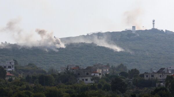 Дым после израильского артиллерийского обстрела на территории Ливан в районе границы с Израилем. 9 октября 2023