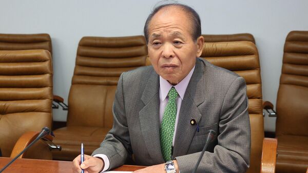 Депутат верхней палаты японского парламента Мунэо Судзуки