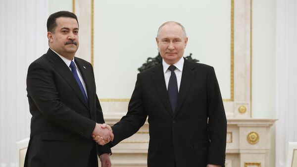 Президент РФ Владимир Путин и премьер-министр Ирака Мухаммед ас-Судани во время встречи в Москве. 10 октября 2023