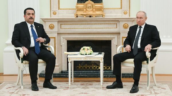 Президент РФ Владимир Путин и премьер-министр Ирака Мухаммед ас-Судани во время встречи в Москве