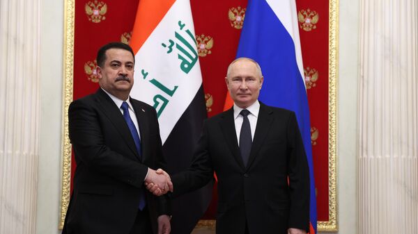 Президент РФ Владимир Путин и премьер-министр Ирака Мухаммед ас-Судани во время встречи в Москве