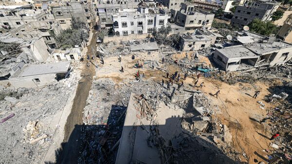 Разрушенные дома после израильского удара в Хан-Юнисе на юге сектора Газа
