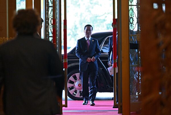  Президент Вьетнама Во Ван Тхыонг перед началом встречи в Пекине с президентом РФ Владимиром Путиным