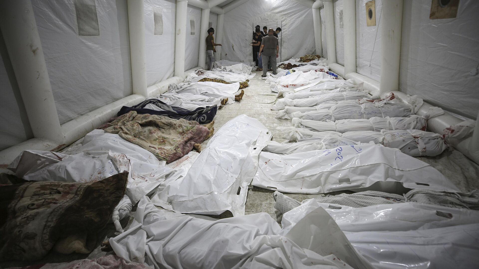 Погибшие в результате удара по больнице Аль-Ахли в секторе Газа - РИА Новости, 1920, 18.10.2023