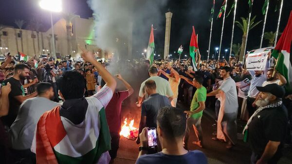 Протесты в Триполи после взрыва в больнице Аль-Ахли в Газе