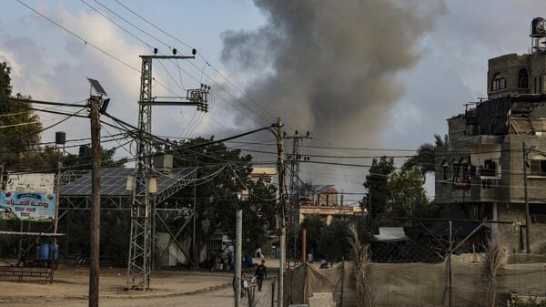 Ды от израильского удара по городу Рафах на юге сектора Газа