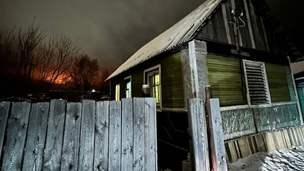 Дом на дачном участке в Мирном, где были обнаружены тела четырех человек с огнестрельными ранениями