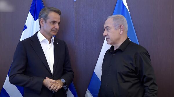 Премьер-министр Греции Кириакос Мицотакис и премьер-министр Израиля Биньямин Нетаньяху во время встречи. Кадр видео