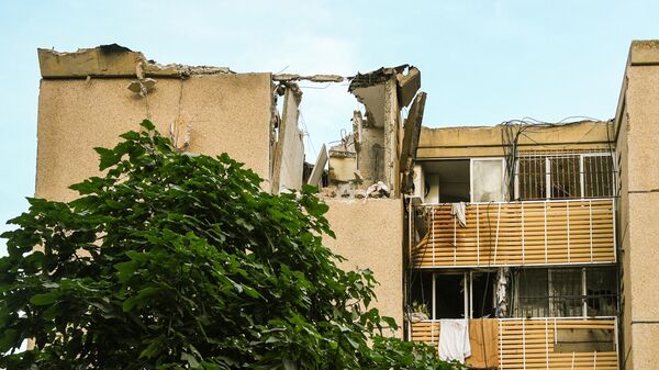 Жилой дом в Тель-Авиве, поврежденный в результате обстрела со стороны сектора Газа