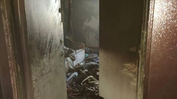 Место пожара в многоквартирном доме в Азове