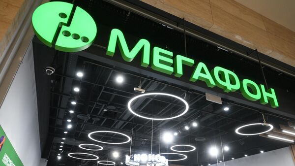 Логотип в офисе компании Мегафон в Москве