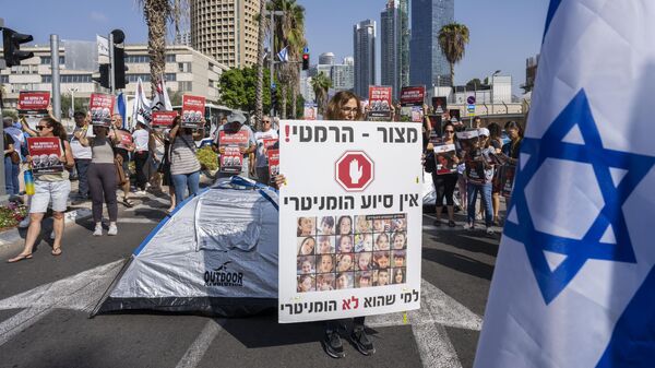 Акция протеста родственников людей, находящихся в заложниках у ХАМАС, в Тель-Авиве