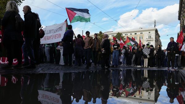 Участники акции в поддержку Палестины в Риме, Италия. 4 ноября 2023