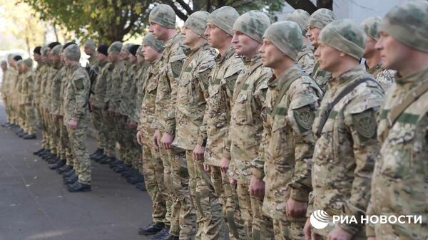 Бойцы батальона имени Богдана Хмельницкого, первого подразделения, состоящего из бывших украинских военнопленных, принесли присягу России