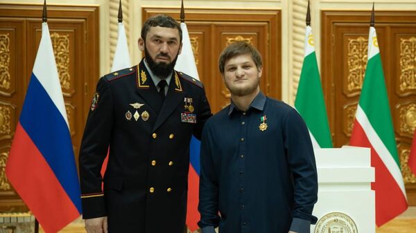 Слева направо: глава регионального парламента Магомед Даудов и Ахмат Кадыров, старший сын Рамзана Кадырова