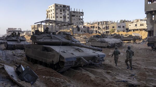 Израильские военные во время наземной операции в секторе Газа