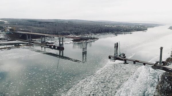 Строительство нового моста через реку Томь