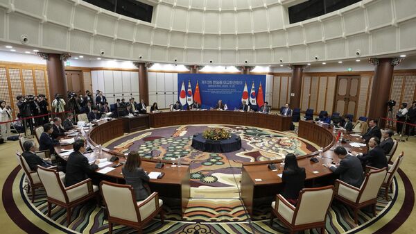 Главы МИД Южной Кореи, Китая и Японии на встрече в Пусане