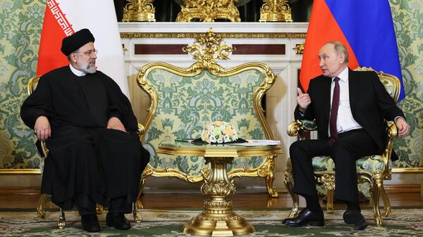 Владимир Путин и президент Ирана Эбрахим Раиси во время встречи в Москве