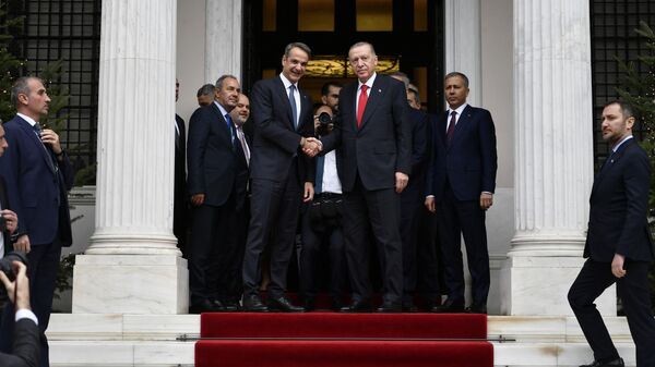 Премьер-министр Греции Кириакос Мицотакис и президент Турции Реджеп Тайип Эрдоган после переговоров в Афинах. 7 декабря 2023