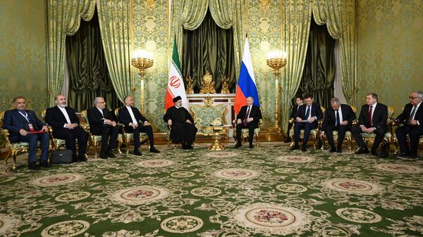Владимир Путин и президент Ирана Эбрахим Раиси во время встречи в Москве