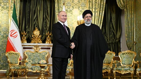 Президент РФ Владимир Путин и президент Ирана Эбрахим Раиси во время встречи в Москве